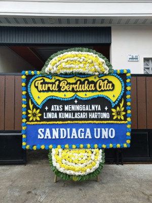 Papan Bunga Duka di Modo