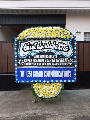 Papan Bunga Duka di Modo